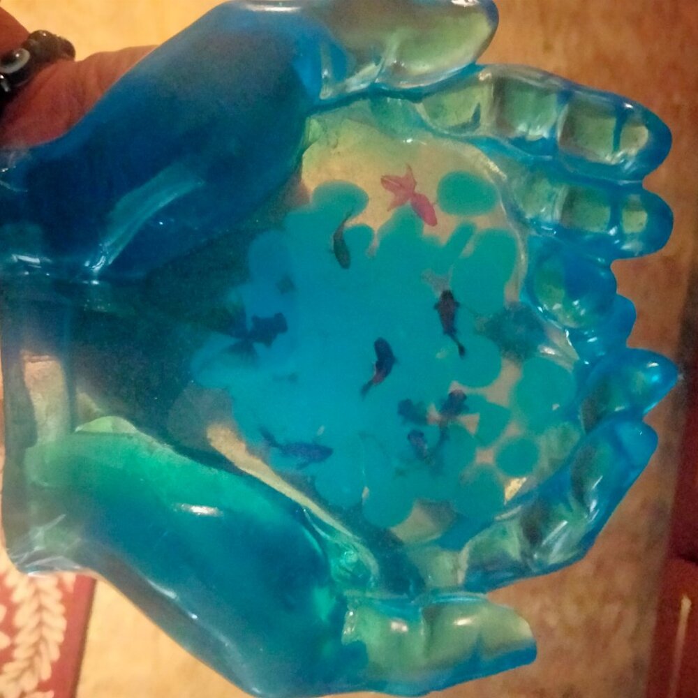 Resin "Hands Holding Fish"